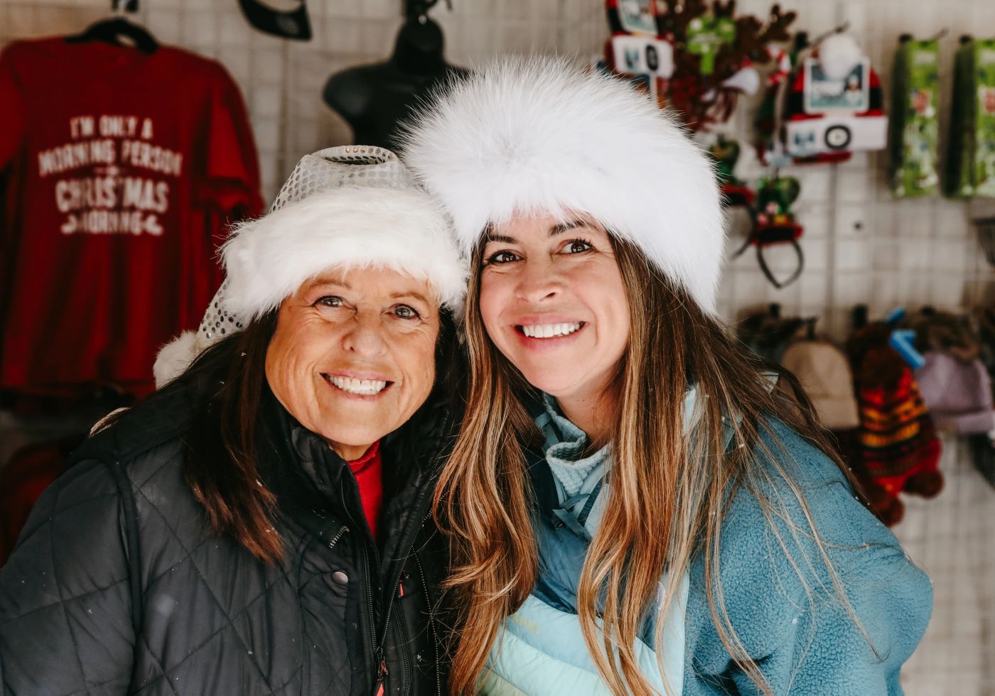 Friends in Santa hats at Christmas in Excelsior